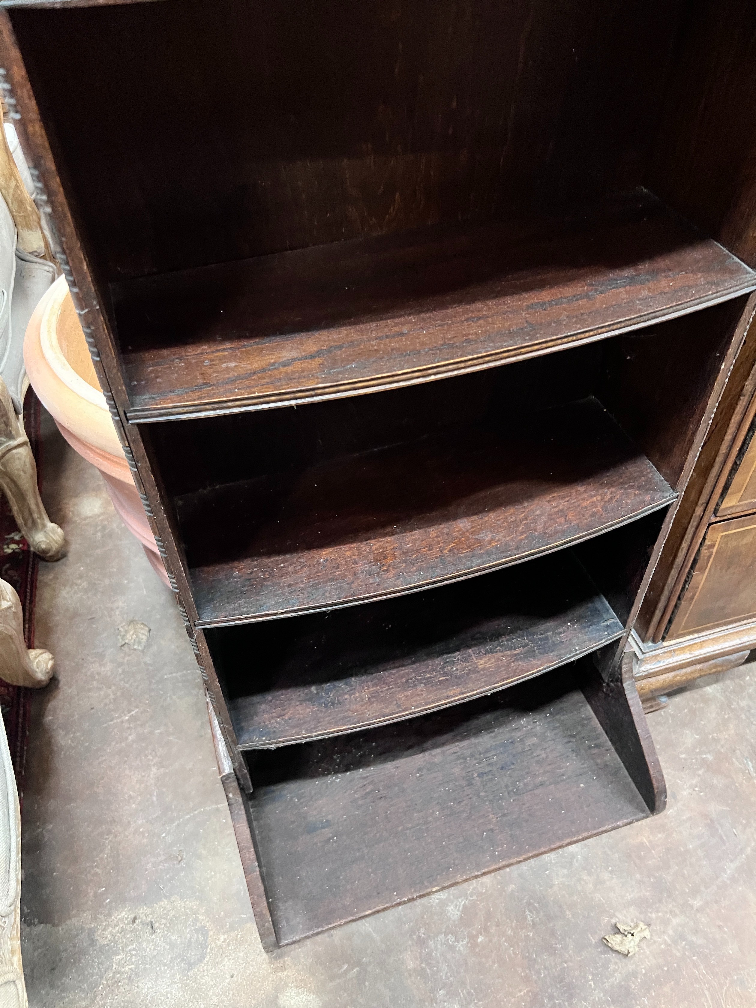 A 1920's oak narrow eight shelf open bookcase, width 49cm, depth 30cm, height 161cm *Please note the sale commences at 9am.